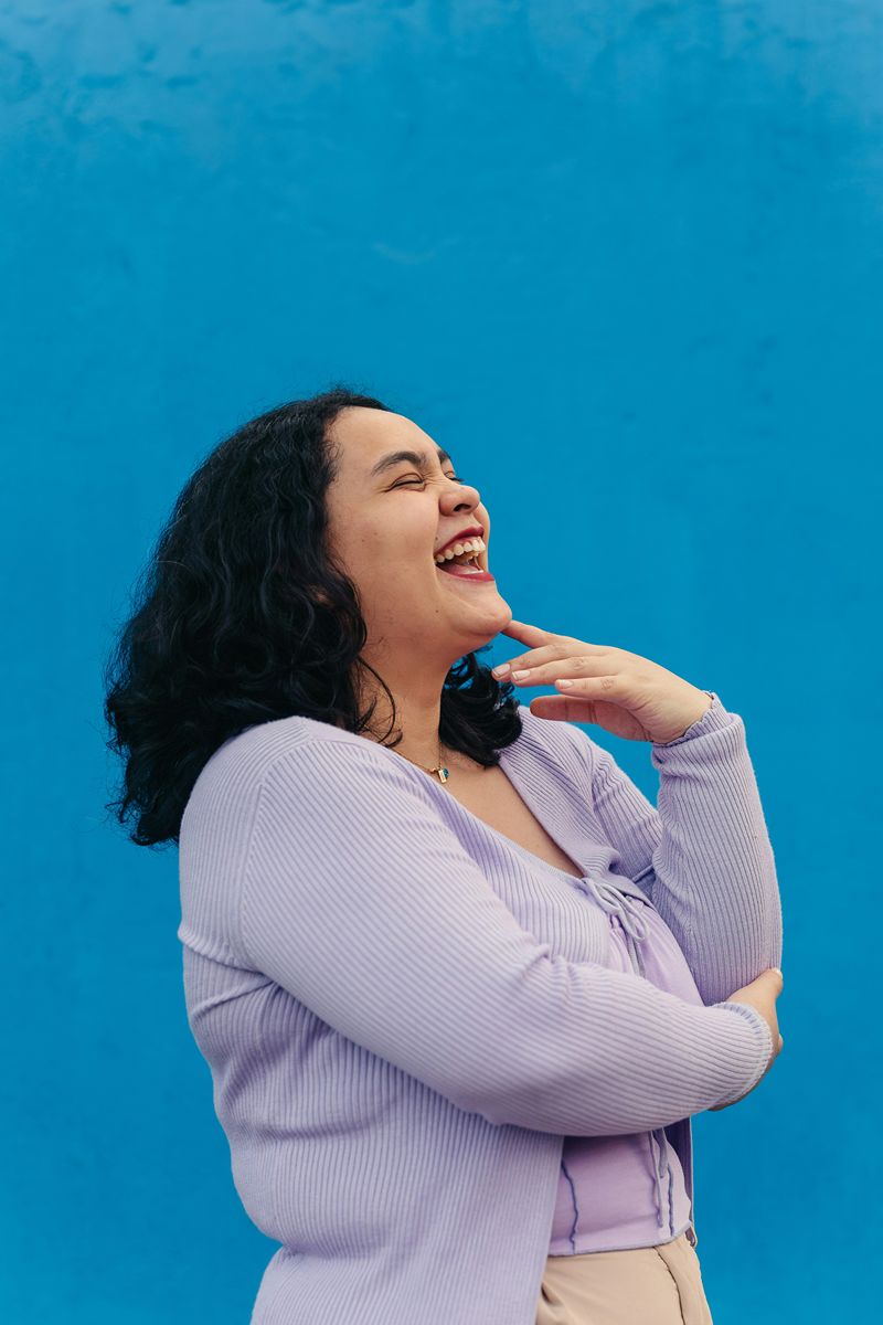 Woman laughing joyfully